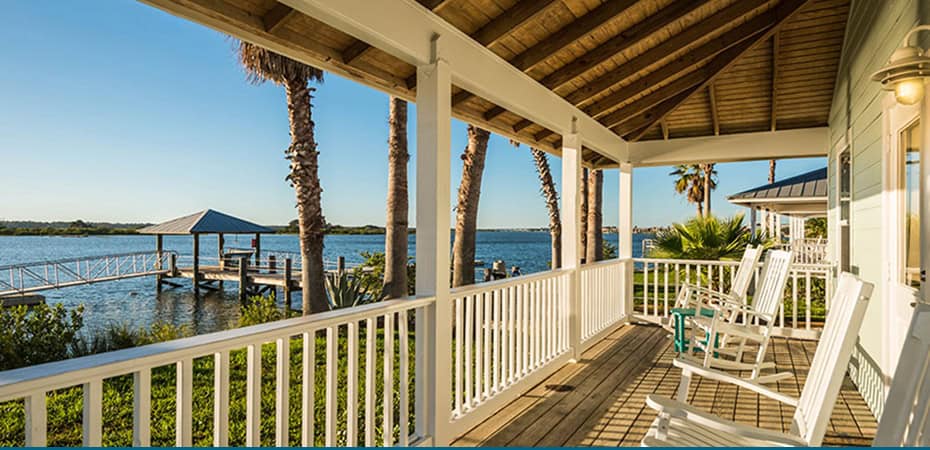 Scenic view from the porch of Devil's Elbow Fishing Resort overlooking the water.
